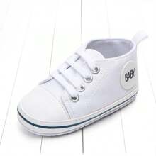 Zapatos blancos para bebé, diseño simple de cordones para niños y niñas, moda suave, suela antideslizante, zapatos planos para recién nacidos