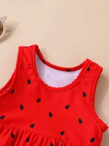 Conjunto de tankini y shorts para niña con estampado de sandía, volantes y lazo decorativo, ideal para el verano