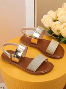 Sandalias planas doradas de estilo y comodidad para niños para vacaciones en la playa