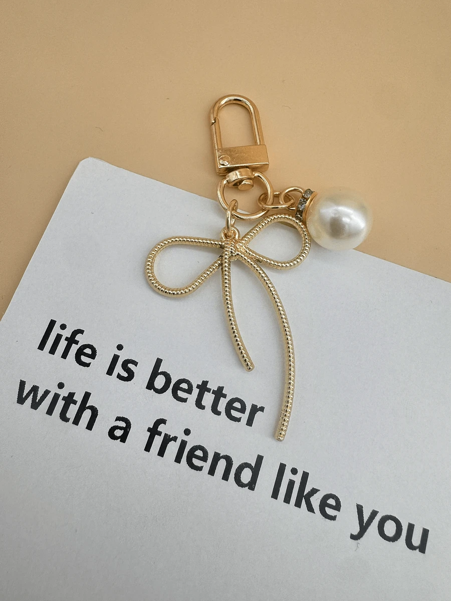 Một chiếc móc khóa thắt nút đơn giản và đa năng làm bằng hợp kim dành cho phụ nữ Một món quà nhỏ để tặng cho bạn thân Quà tặng phù dâu Nơ mùa hè - Vàng - View 1