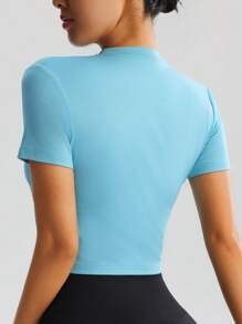 Chaqueta deportiva de manga corta ajustada y transpirable para mujer, con cuello alto y cremallera, apropiada para yoga, correr y gimnasio