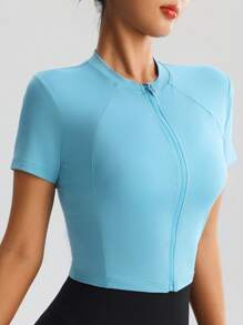 Chaqueta deportiva de manga corta ajustada y transpirable para mujer, con cuello alto y cremallera, apropiada para yoga, correr y gimnasio