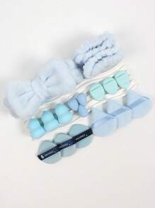 一套18件化妆工具，包括3个三角粉扑，3个迷你化妆蛋，3个粉扑气垫，3个迷你拇指粉扑，3个葫芦化妆蛋，1个发带和2个腕带。带有柔软蝴蝶结洗脸头带的全新高吸引力发饰组合。