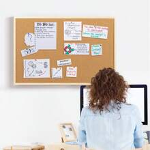 Eine Korktafel mit Holzrahmen, Pinnwand zum Aufhängen, Notiztafel, dekoratives Bürobrett, Nachrichtentafel für Zuhause und die Schule