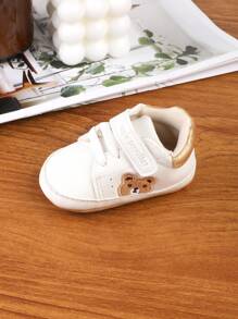 1 par barnskor med tecknade PU-kardborreband, platta och halkfria sportskor för vardagsbruk, lämpliga för vår och höst