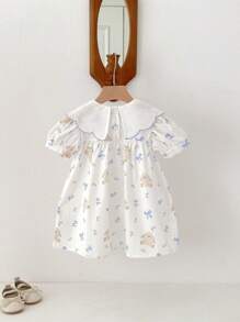 Váy bé gái dễ thương hình gấu, nơ và họa tiết hoa xếp nếp - Màu xanh lam - Xem 3