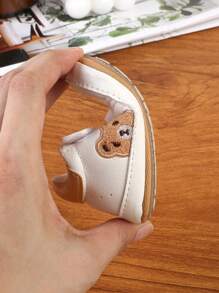 1 par barnskor med tecknade PU-kardborreband, platta och halkfria sportskor för vardagsbruk, lämpliga för vår och höst