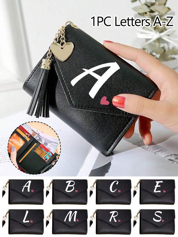 1 pièce Petit portefeuille pliant pour femme en PU noir avec lettres A-Z et cœur rose, porte-monnaie mignon et joli pour fille, porte-cartes de mode femme avec mini pompon, portefeuille imperméable, portable, grande capacité de cartes de crédit