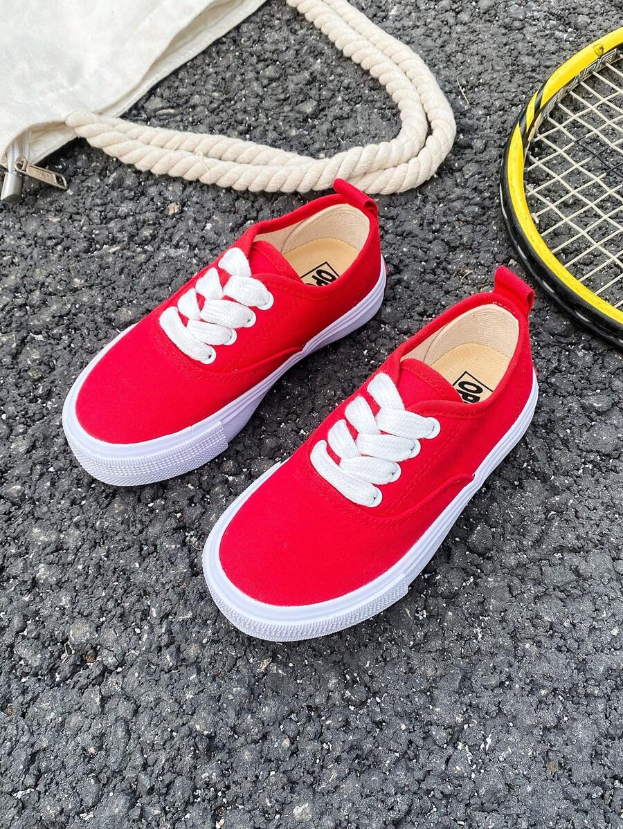 Giày vải trắng Giày trẻ em màu trắng Giày thể thao trung bình Giày vải trẻ em Mùa xuân và mùa thu Phiên bản Hàn Quốc Giày đơn giản cho bé trai và bé gái Giày thể thao cổ thấp buộc dây thường ngày Giày vải cổ thấp cổ điển Tất cả các môn thể thao thường ngày Giày trượt ván trẻ em - Đỏ - Xem 1