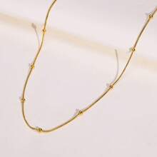 Conjunto de joyería de collar y pulsera con forma de corazón romántica, de acero de titanio en tono dorado, diseño único para mujer