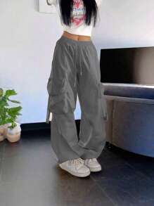 街头高腰翻盖口袋抽绳腰部弹性下摆褶饰休闲阔腿降落伞工装裤