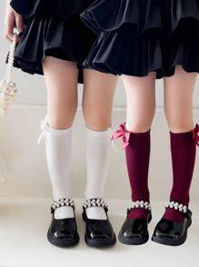 2 双女孩纯色蝴蝶结装饰透气及膝袜，适合日常穿着