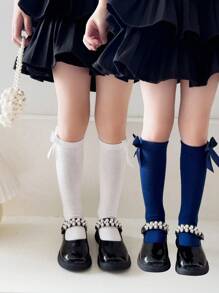 2 双女孩纯色蝴蝶结装饰透气及膝袜，适合日常穿着
