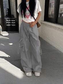 街头高腰翻盖口袋抽绳腰部弹性下摆褶饰休闲阔腿降落伞工装裤