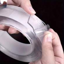 这款纳米胶带足够长，具有超强粘性和高透明度。它也是一种可清洗的双面胶带，可以重复使用。它防水耐热，适用于舒适的家庭、潮湿的浴室、烟雾缭绕的厨房或日常办公环境中的各种粘合需求。