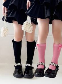 2 双女孩纯色蝴蝶结装饰透气及膝袜，适合日常穿着