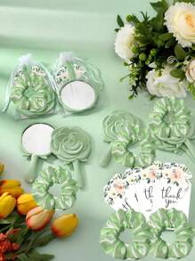 Gương cầm tay màu xanh lá cây