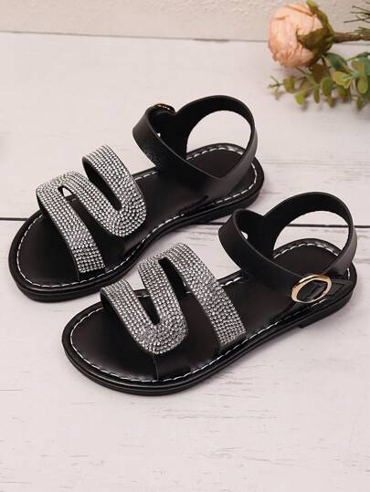 1 Pair Black Plus Size Toddler Girls' Flat Sandals, Solid Color PU Strap With Rhinestone Decoration, Back Strap With Metal Buckle And Hook And Loop Closure, Round Toe, Anti-Slip, Fashionable & Cute Roman Beach Sandals Suitable For 3-15 Years Old Girls, Spring/Summer 2025