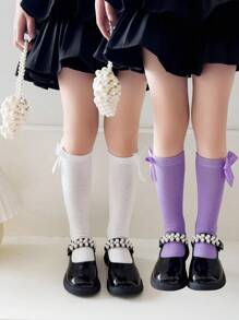 2 双女孩纯色蝴蝶结装饰透气及膝袜，适合日常穿着