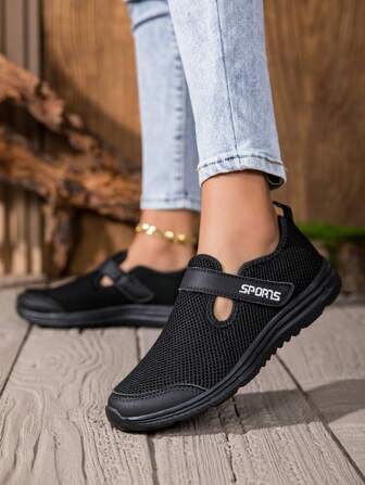 Sneaker casual slip-on da donna, scarpe piatte in maglia nera traspirante, larghezza ampia