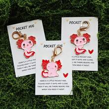 可爱的迷你蝾螈钥匙扣口袋拥抱卡，是送给动物爱好者的积极而幸运的小礼物，非常适合生日、婚礼、情人节、复活节、母亲节、父亲节，以及作为特殊的鼓励象征或励志珠宝。 - 彩色 - 查看 5