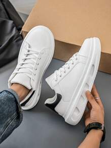 Baskets de style minimaliste pour hommes, de couleur unie, à lacets avant confortables et avec plateforme. Chaussures de skateboard unisexes décontractées et légères, à bout rond, pour l'extérieur, en noir