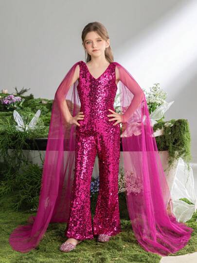 Dziewczęcy kombinezon z głębokim dekoltem w serek, zdobiony cekinami i prześwitującą siateczką, z długimi rękawami