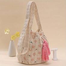 编织抽绳水桶包，可爱休闲大容量流苏手提单肩斜挎包，印花拼色时尚，适合通勤、旅行、海滩