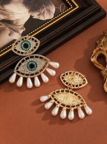 1 paire de boucles d'oreilles pour femme mode dramatique avec strass et faux perles en forme d'œil de diable, convient pour toutes les saisons, les soirées et le travail