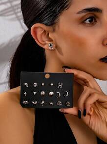 Set de 9 pares de aretes de estilo gótico con diseños de estrella, luna, araña y rosa, de alta gama, para uso casual y de viaje