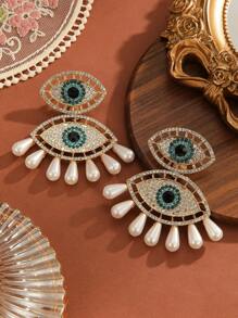 1 paire de boucles d'oreilles pour femme mode dramatique avec strass et faux perles en forme d'œil de diable, convient pour toutes les saisons, les soirées et le travail