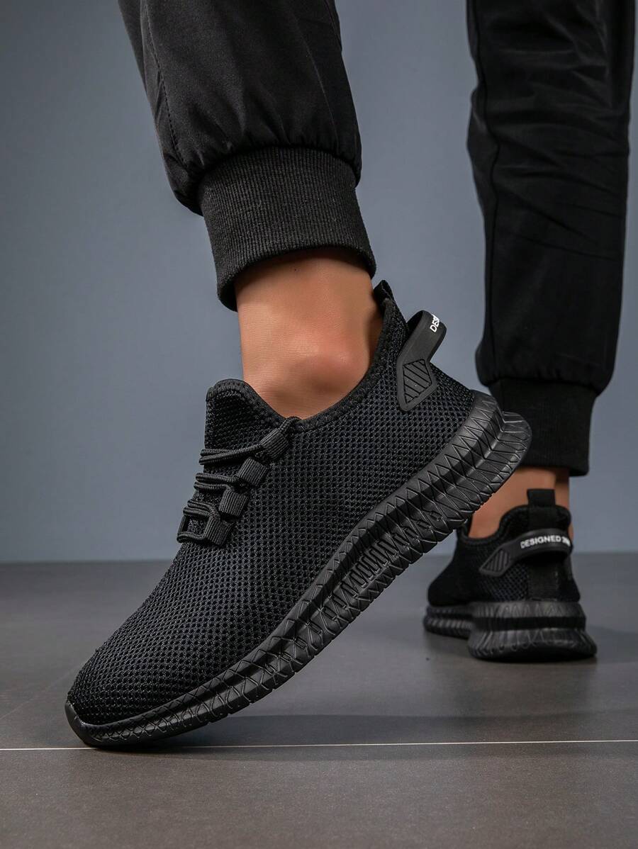 2024 Bequeme einfarbige Herrenschuhe in Große Größen, leicht, atmungsaktiv, angenehmes Mesh-Obermaterial, weiche Sohle, Sportschuhe für den täglichen Gebrauch und Spazierengehen, Collegestil - Schwarz - Übersicht 1