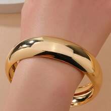 1 pieza Brazalete de metal liso y de color dorado de moda y lujoso para mujeres, apto para uso diario