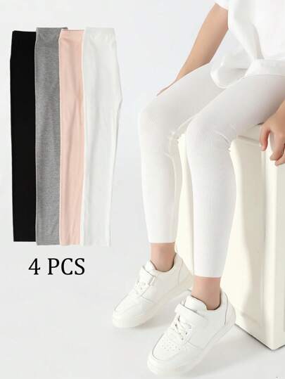 4 paires de leggings courts à rayures verticales de couleur unie pour filles. Bas ajustés élastiques et mince. Pantalon de yoga décontracté pour toutes les saisons, style sportif mignon, convient pour un usage quotidien d'étudiante, doux et confortable, polyvalent, pour la rentrée scolaire