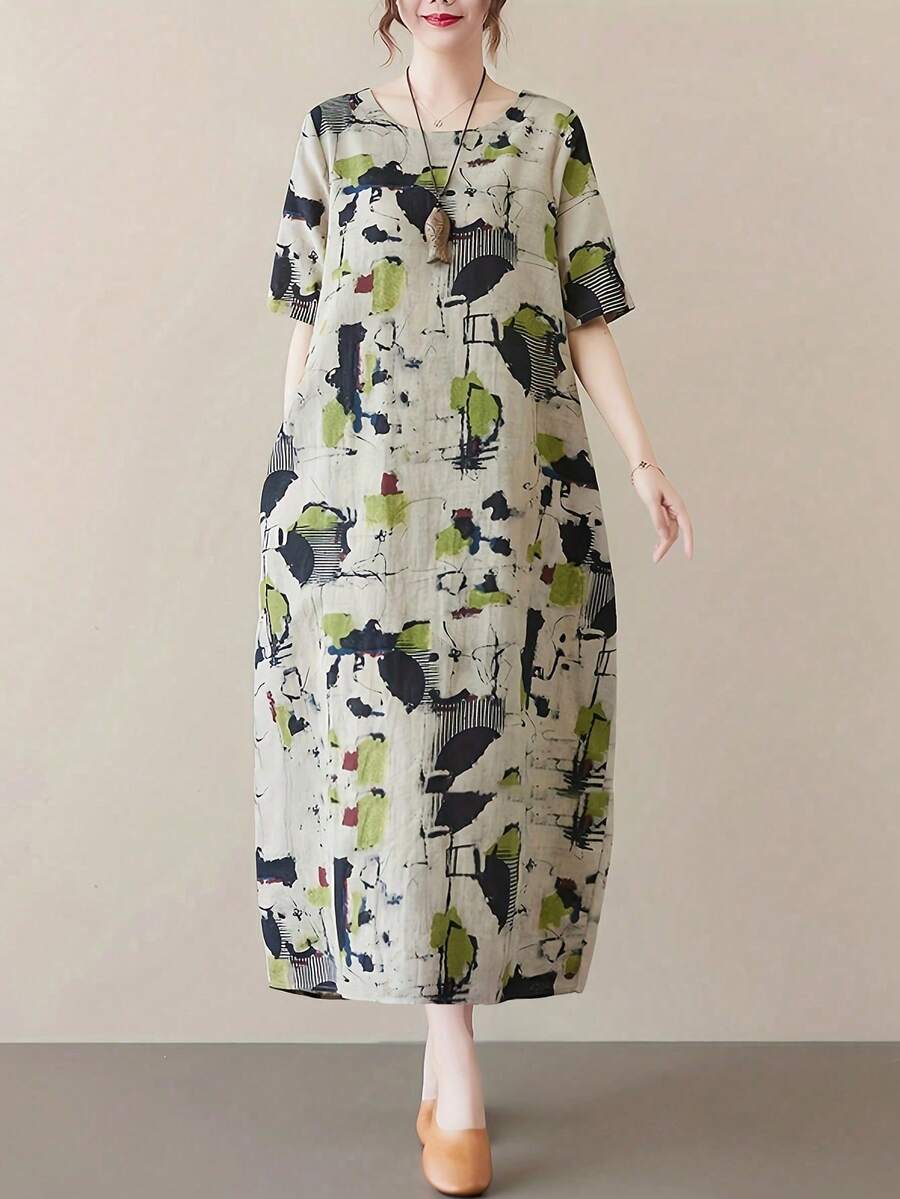女士中长连衣裙，抽象印花，圆领，短袖，带口袋，采用无弹力梭织面料，阿拉伯风格