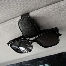 1 pieza Clip para gafas de sol de General Motors, soporte para gafas de coche, accesorios de coche, soporte de almacenamiento de gafas, clip para gafas de coche, soporte plegable magnético de succión para gafas