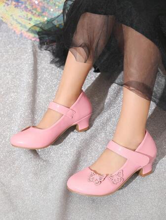 1 par snygga, livfulla rosa flickskor med klack, gjorda av massivt tyg med ihålig fjärilsdekor, utrustad med massagesula för extra komfort, lämpliga för fester och vardagsbruk, alla årstider