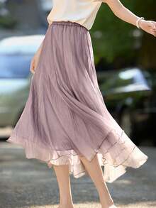 Gonna elegante e graziosa di moda primaverile/estiva di colore viola con effetto velato