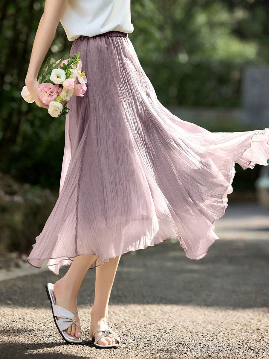 Gonna elegante e graziosa di moda primaverile/estiva di colore viola con effetto velato