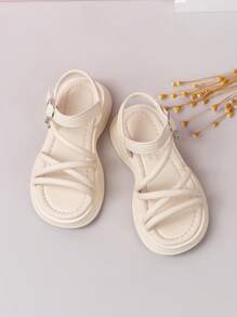 1 par de sandalias planas para niños, sandalias de niña de moda color beige con correa calada, suela suave y cómoda, nuevo estilo de verano