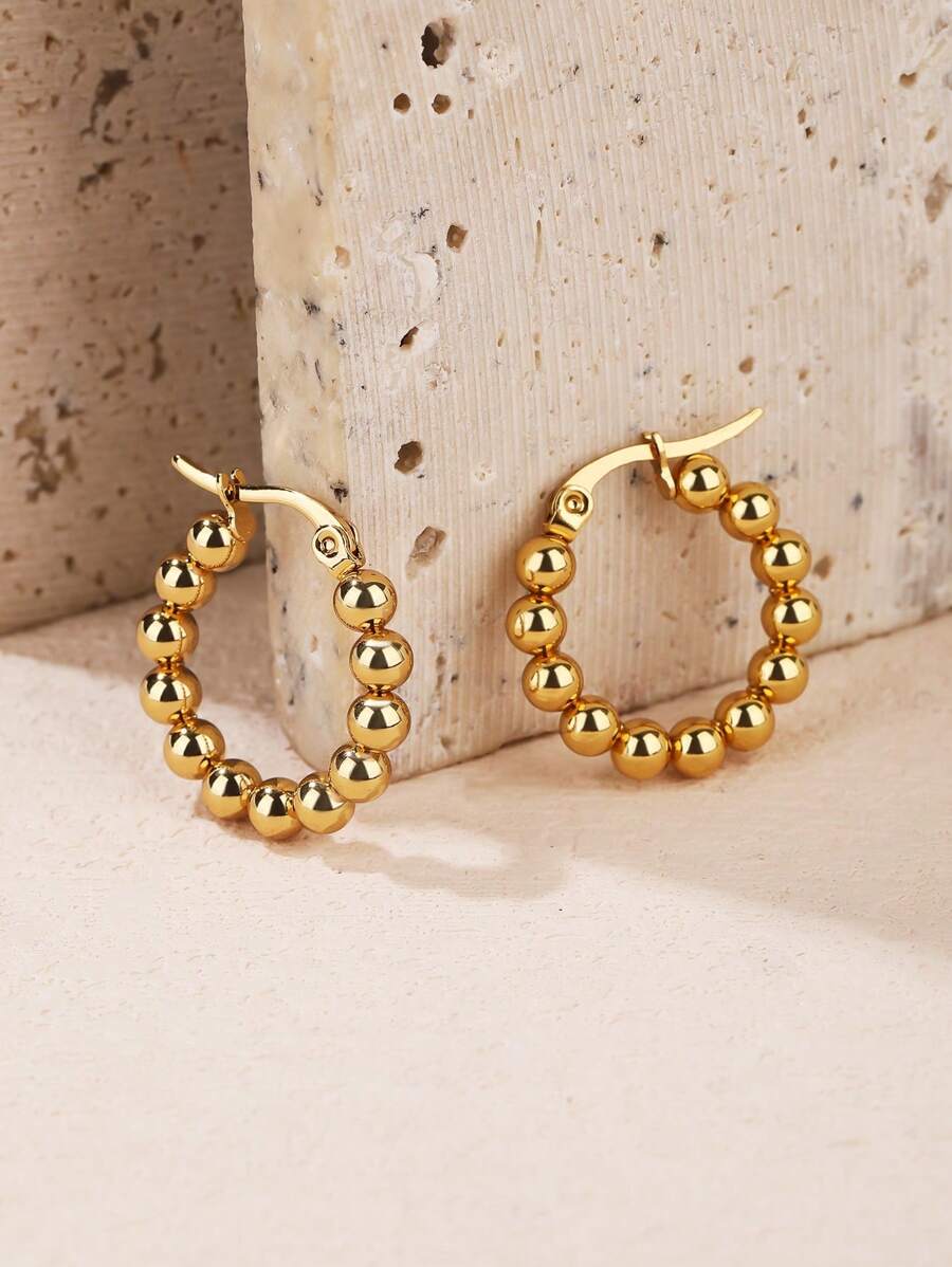 Un par de pendientes pequeños y redondos con cuentas, de estilo sencillo y de moda - Amarillo Oro - Ver 1
