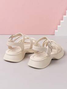 1 par de sandalias planas para niños, sandalias de niña de moda color beige con correa calada, suela suave y cómoda, nuevo estilo de verano