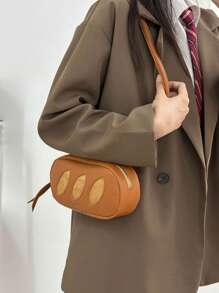 2025 Nouveau sac cosmétique créatif et mignon en forme de pain fait main, avec style de niche. Sac bandoulière croisé