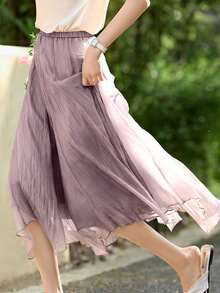 Gonna elegante e graziosa di moda primaverile/estiva di colore viola con effetto velato