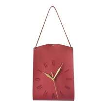 Une horloge de sac suspendu au design créatif d'art moderne. Décoration vintage personnalisée pour le salon. Horloge décorative silencieuse pour la maison et la chambre à coucher. Pendentif d'horloge de style moderne et luxueux, très attrayant. Horloge murale en forme de sac pour restaurant et café