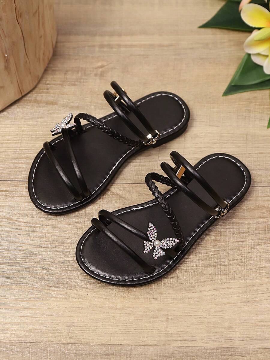 1双加大码黑色女童/小女孩平底凉鞋,饰有闪亮珍珠和蝴蝶图案,弹性鞋带,圆头设计,防滑,时尚可爱的罗马风格凉鞋,适合日常穿着、派对、度假、休闲场合,2025新款 - 黑色 - 查看 1