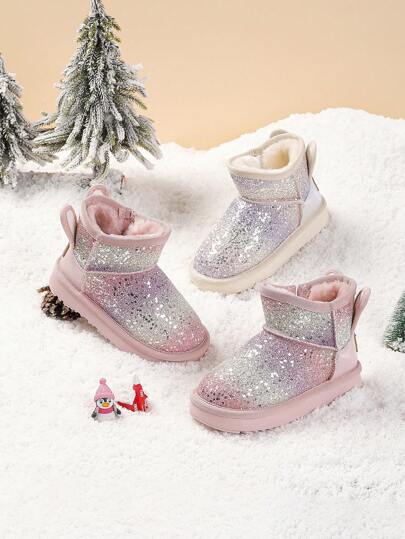 Annil Sněhule pro dívky jsou zateplené a v zimě zesílené. Jsou pro dívky v severovýchodní Číně. Jsou také voděodolné a protiskluzové dětské boty.