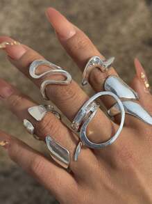 Juego de 4 anillos curvos con diseño sencillo y asimétrico con efecto hueco