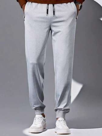 Pantalones casuales de primavera/verano para hombres, para deportes al aire libre, negocios, con bolsillos con cremallera, cintura elástica, pierna recta estampada, transpirables, pantalones largos