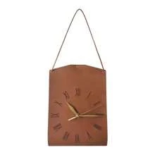 Une horloge de sac suspendu au design créatif d'art moderne. Décoration vintage personnalisée pour le salon. Horloge décorative silencieuse pour la maison et la chambre à coucher. Pendentif d'horloge de style moderne et luxueux, très attrayant. Horloge murale en forme de sac pour restaurant et café